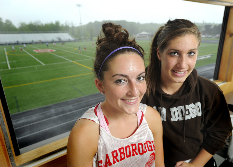 Brittany Ross, left, and Ellie Morin of Scarborough know what it's like to win Class A state titles – they've already done it in field hockey and basketball – and now they're urging their unbeaten lacrosse teammates. The Red Storm will meet Kennebunk in a regional semifinal.