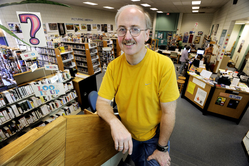 Steve Weigle manages the Riverton branch of the Portland Public Library. School officials are considering using part of the library for adult education programs.