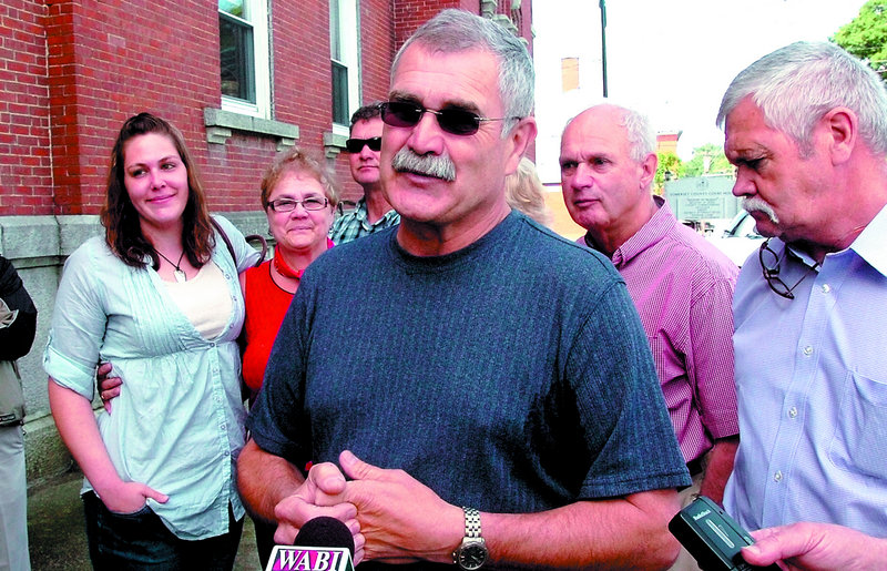 Luke Brochu, brother of Louise Brochu, speaks outside Somerset County Superior Court in Skowhegan on Friday. Earlier, 31-year-old Jeffrey LaGasse of New Portland was sentenced to 30 years in prison for her death. Louise Brochu’s daughter Emily is at left.