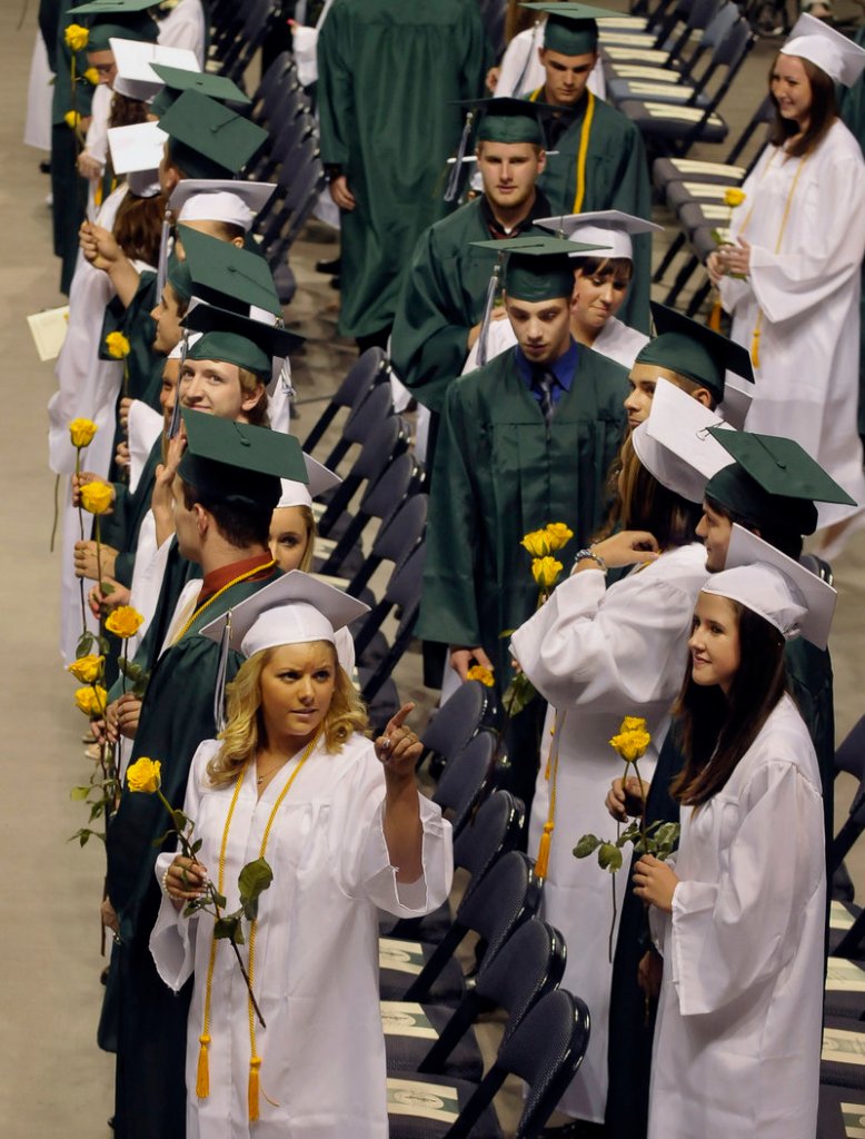 Graduates look for family and friends Friday as they file into the Cumberland County Civic Center in Portland for Bonny Eagle High School’s graduation exercises. Altogether, 273 seniors received diplomas at ceremonies that went off without a hitch.