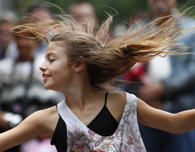 Kayleigh Bowen, 10, of Gray spins while performing with the Pulse Dance Company.