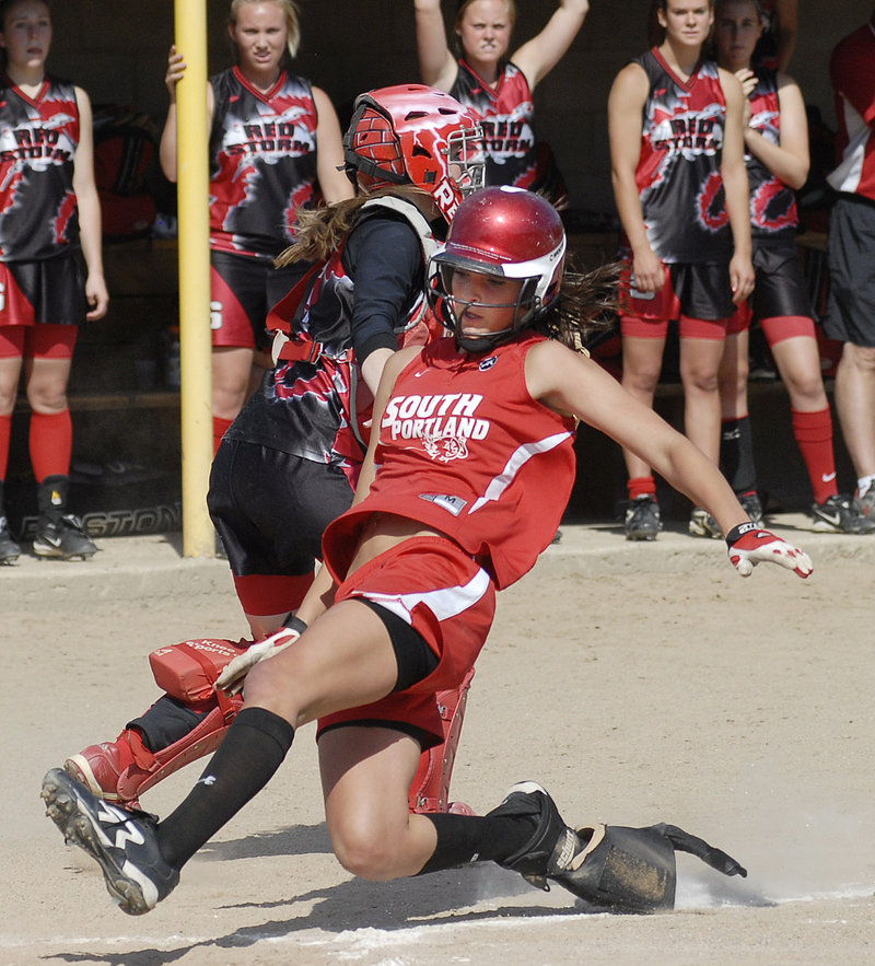 Erin Bogdanovich slides home with South Portland’s first run in the third inning. The Riots had lost 12 of their previous 13 games against Scarborough.