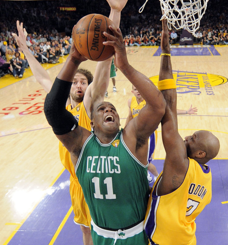 Glen Davis of the Boston Celtics finds room between Lamar Odom, right, and Pau Gasol of the Los Angeles Lakers. Davis played 27 minutes without scoring, receiving extra minutes when Kendrick Perkins was sidelined with a sprained knee.