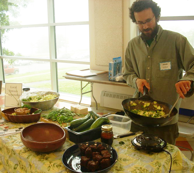 Jonah Fertig of Local Sprouts Cafe served up free samples of vegetarian eats made from local ingredients at the 2009 Vegetarian and Vegan Food Festival.