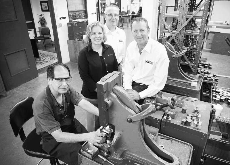 Inspirus, a company based in Fort Worth, Texas, that designs retention and recognition programs, has seen a boost in business as the economy slowly comes back and employers try to find ways to keep employees who made it through all the hardships. From left are Frank Torres, Kimberly Smithson-Abel, Michael Cobb, president, and CEO Pete Chambers.