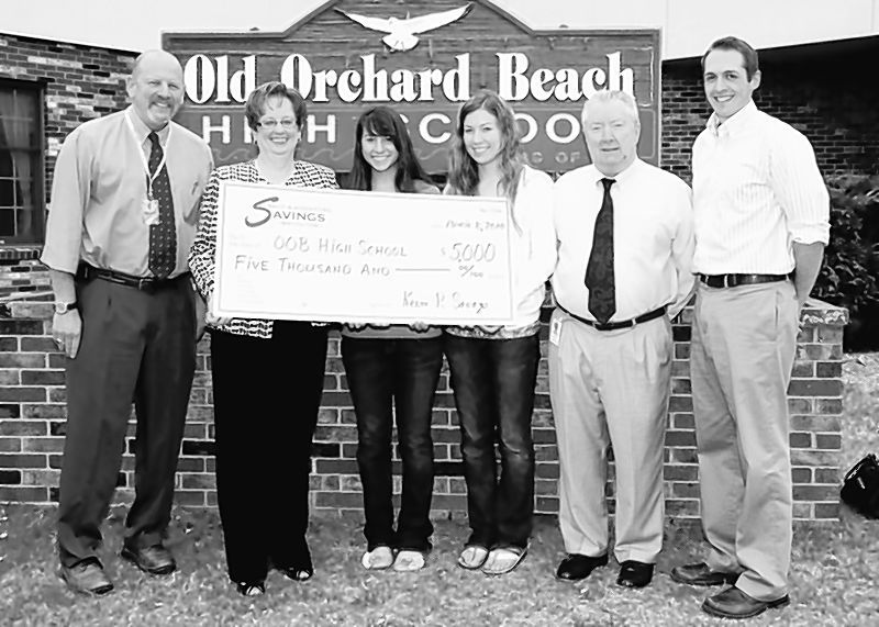 Saco & Biddeford Savings Institution donated $5,000 toward an electronic message board to keep Old Orchard Beach High School students abreast of school activities and events.