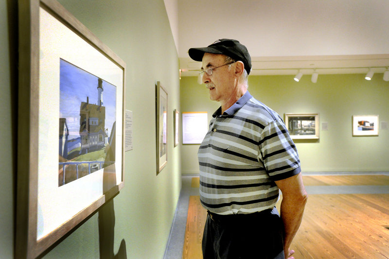 Ferris Jacobs of Portland takes in the Portland Museum of Art’s exhibit “American Moderns.” The museum registered its second-highest attendance in the last fiscal year.