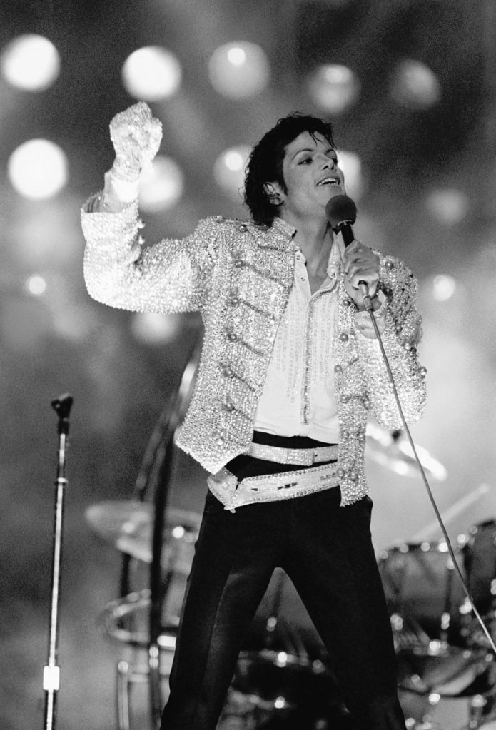Singer Michael Jackson performs during his “Victory Tour” in July 1984, wearing the Swarovski-crystal-studded glove that sold for $190,000.