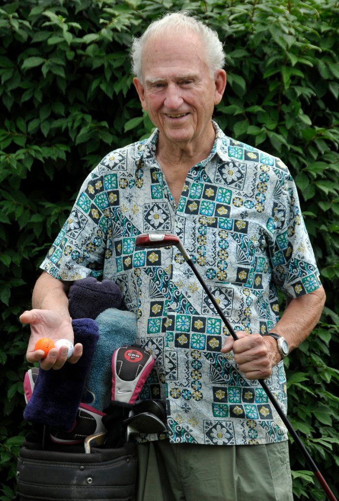 Warren Gilman of Westbrook scored the fourth hole-in-one of his playing career last week at Point Sebago in Casco. Gilman, 84, holds two of the balls he has shot for aces.