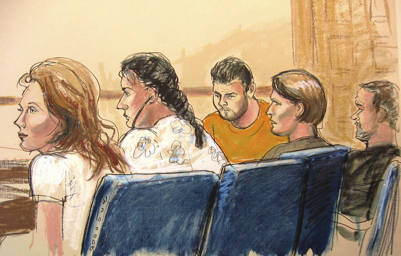 In an artist’s drawing, five of the suspects are seen in Manhattan federal court in New York on Monday. Officials say that in addition to the 10 arrests, an 11th suspect is being sought. They are believed to have been deep-cover spies, living in U.S. suburbs and infiltrating policymaking circles.