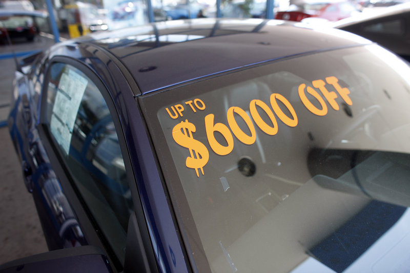 Disappointing car sales could eventually pose good news for consumers, as dealers are forced to offer incentives – such as this $6,000 price cut on a 2009 Mustang GT in Denver – to lure buyers back to showrooms.