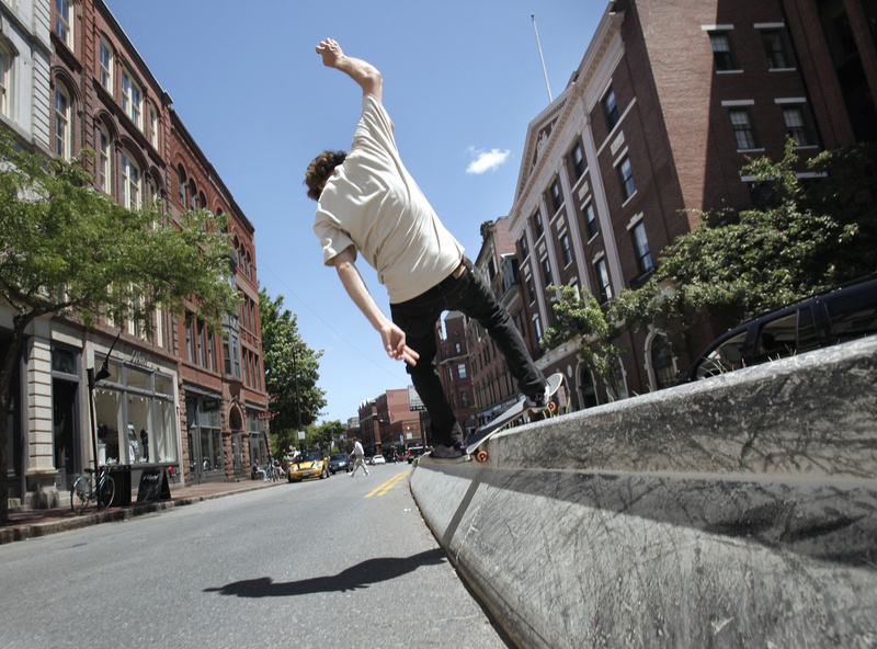 Louis Reimensnyder grinds along the median divider on Middle Street in Portland on Wednesday. Later this summer, the city plans to build a $250,000 skate park at Dougherty Field near the I-295 overpass on Congress Street, but its design has generated some criticism from skateboarders. Reimensnyder says a skate park is desirable for the city. Ã¢ÂÂIt does get people out of the streets,Ã¢ÂÂ he said.
