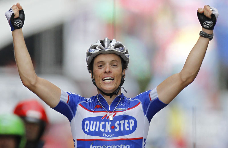 Sylvain Chavanel of France crosses the finish line to win the second stage of the Tour de France today.