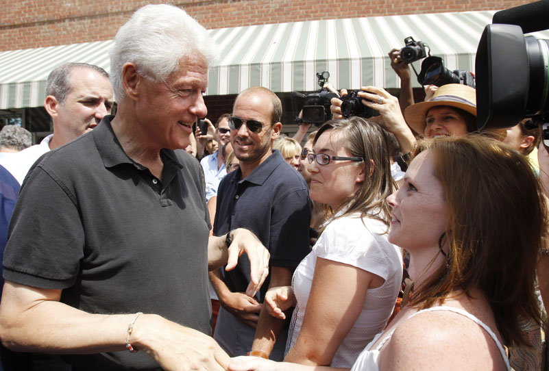 Former President Bill Clinton talks to well-wishers as he leaves a restaurant in Rhinebeck, N.Y., today.