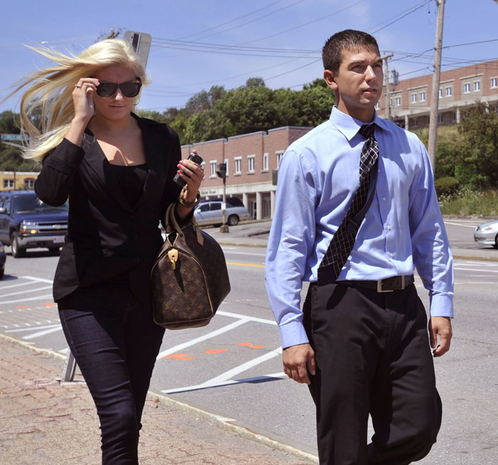 Derek Stansberry, right, and his girlfriend Jillian Krause leave the U.S. Federal Court in Bangor today.