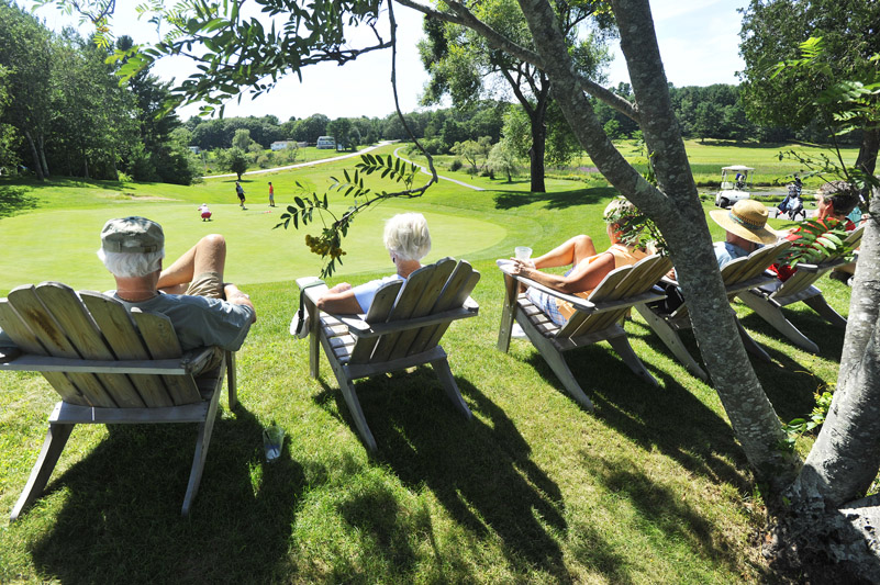 On a perfect day for a little bit of shade, a bit of refreshments and a lot of watching golf, fans sat by the green on the 18th hole Tuesday at the Bath Country Club and followed the golfers in the women’s state championship.