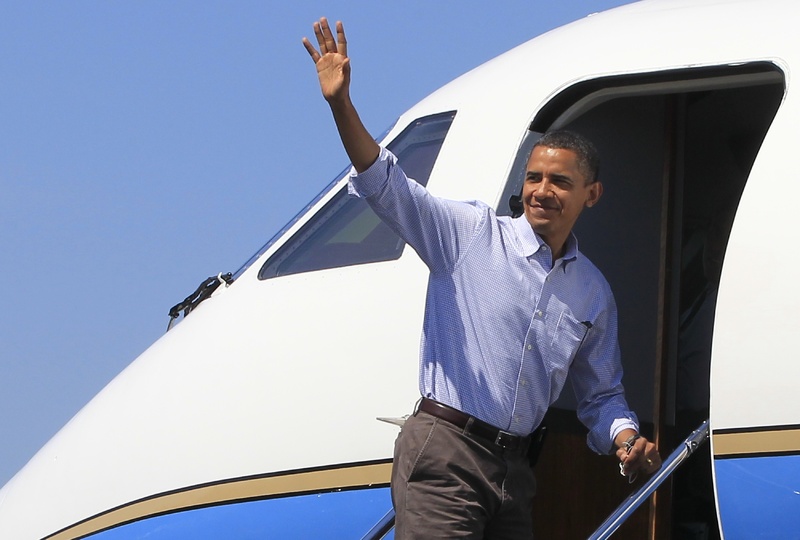 President Obama boards Air Force One at Hancock County-Bar Harbor Airport in Trenton on Sunday for the trip back to Washington.
