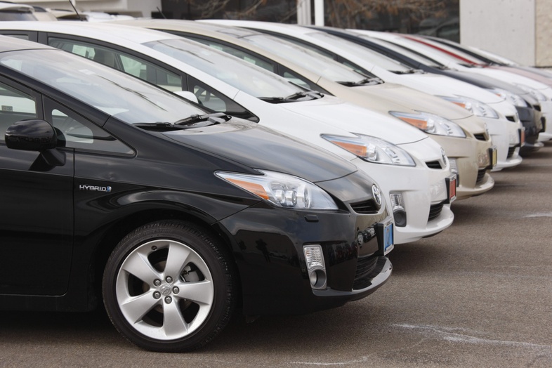 2010 Toyota Prius sedans sit at a Toyota dealership in Englewood, Colo. Some researchers and safety groups say the quiet operation of hybrids can pose risks for unsuspecting pedestrians and the blind who use sound cues to travel safely.