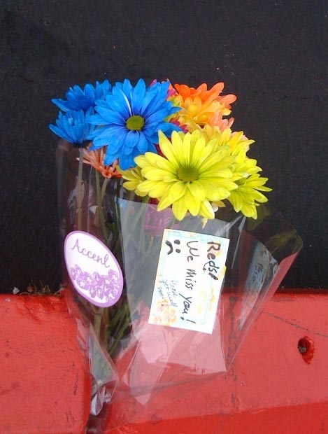 A bouquet was left in the parking lot by a fan who misses Red's Dairy Freeze in South Portland.
