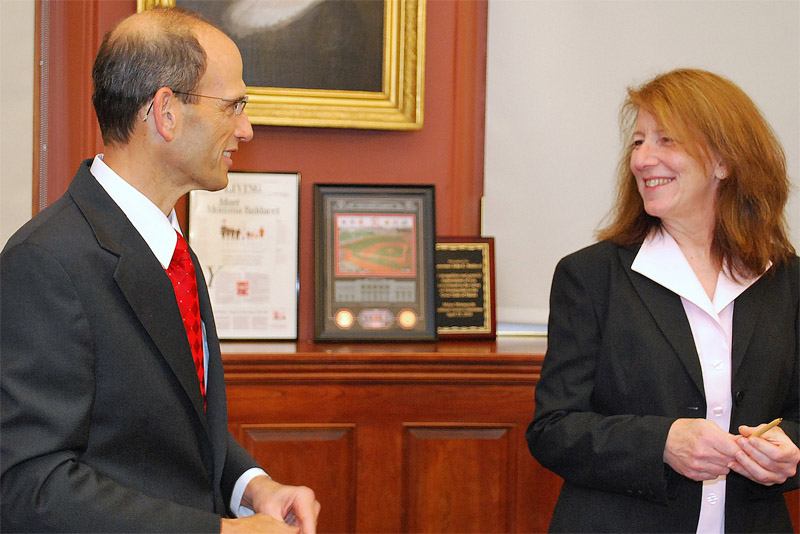 Gov. John Baldacci talks with Ellen Schneiter, new acting commissioner of the Department of Administrative and Financial Services.