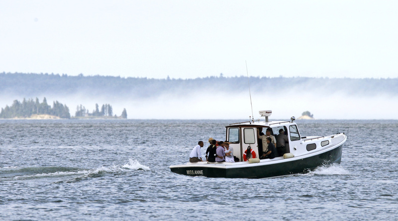The fog on Frenchman Bay didn't prevent the first family from enjoying a boat tour during their visit to Mount Desert Island. Business owners and others interviewed said disruptions associated with a presidential visit were kept to a minimum.