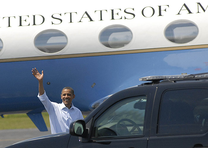 President Obama waves to the press upon arriving in Trenton.
