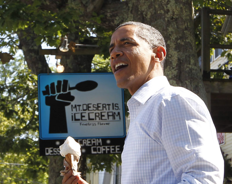 In this July 16, 2010, file photo President Barack Obama holds a coconut ice cream cone after a visit to Mount Desert Island Ice Cream in Bar Harbor.