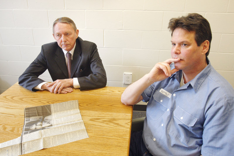 Accompanied by his attorney Steve Peterson, Dennis Dechaine listens to a reporter’s questions during an interview at the Maine State Prison in Warren on March 22. With a new appeal more than two decades after his conviction in the death of Sarah Cherry, no other case has been litigated in Maine’s court system for so long.