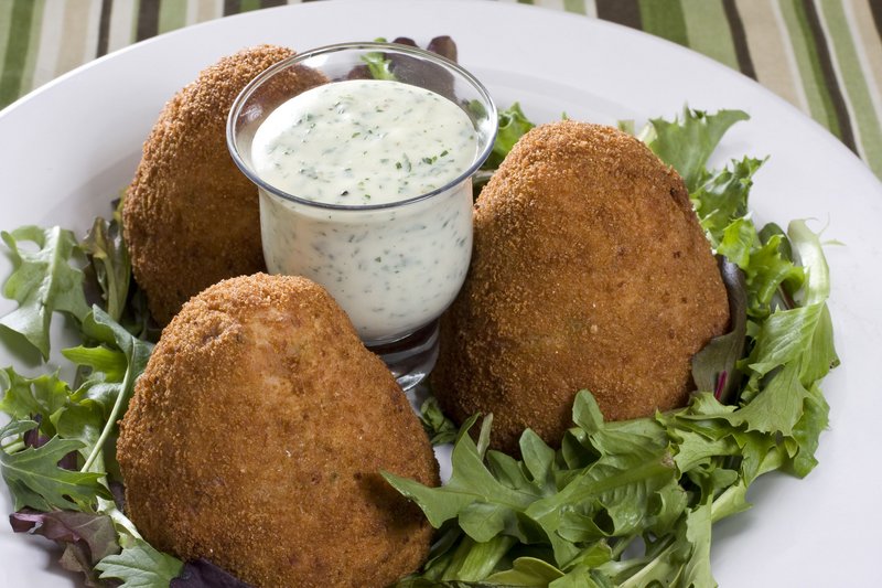 Adapted from James Villas’ “Pig: King of the Southern Table,” these ham croquettes with parsley sauce are great as is ... or add your own favorite ingredients.