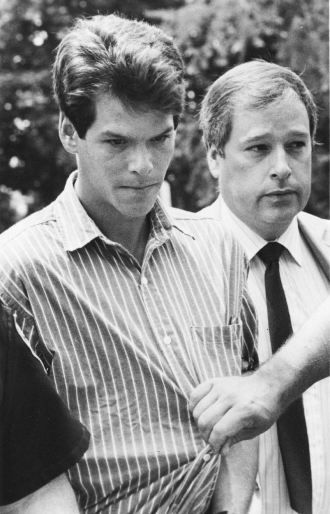 Dennis Dechaine, left, is shown after his arrest in July 1988 for the murder of Sarah Cherry, 12.