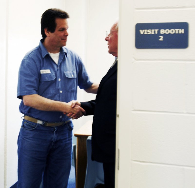 Inmate Dennis Dechaine shakes hands with attorney F. Lee Bailey, right, after a meeting at the Maine State Prison in Warren on April 8, 2009. “All that I promised to do, and have done, is to use past friendships and associations to get Dennis what he couldn’t afford,” Bailey said. “I don’t wish to be an advocate for anybody.”