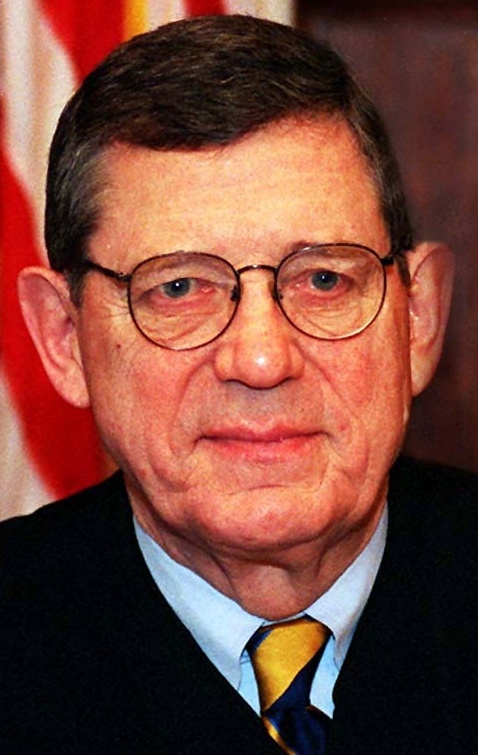 Justice Carl O.Bradford