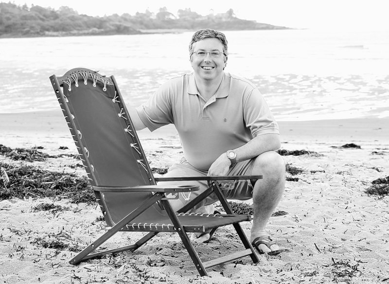 “Every year, something cool sort of comes up where someone wants to talk about them or write about them,” says Brian Fish, founder of Oh Yeah Comfy beach chairs, posing with one of his creations at Higgins Beach.