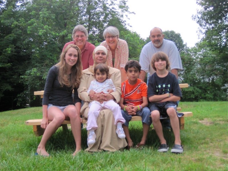 The American Friend program arranged for a Maine family to help an Iraqi family navigate Portland. In front from left are Charlotte Spritz, Zaineb Marwan, Mariam Quasem, Ahmed Quasem and Henry Spritz. In the rear from left are John Spritz, Helen Pelletier and Luay Mohammed.