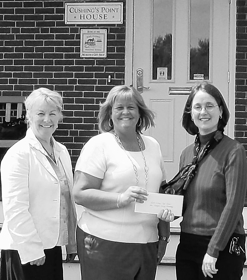 Saco & Biddeford Savings Institution donated $5,000 of the $25,000 that the bank has pledged to the South Portland Historical Society. From left, Betty McGovern, assistant manager of the bank, and Melanie Lee, branch manager, present a check to Kathryn DiPhilippo, executive director of the South Portland Historical Society. The money will fund the historical society's new museum at Bug Light Park. The museum is now open and free of charge.
