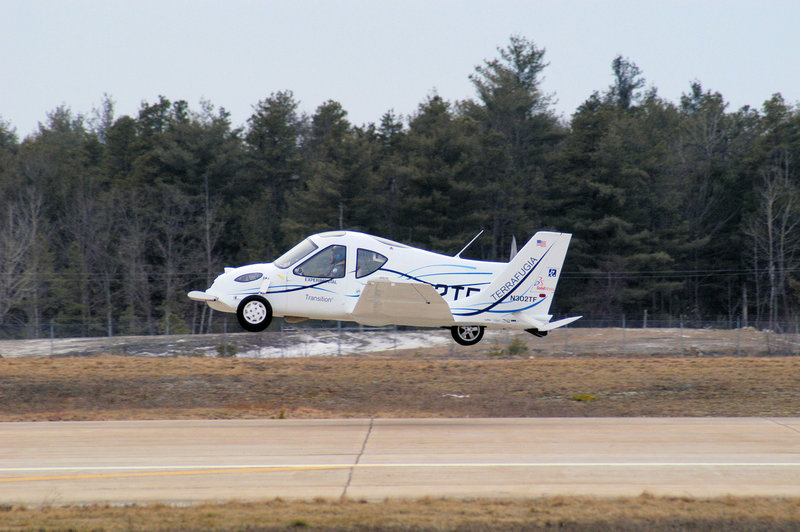 The Transition car-plane is shown taking off. Its makers, Terrafugia, recently gained a waiver to weight restrictions from the Federal Aviation Administration, bringing it closer to production.