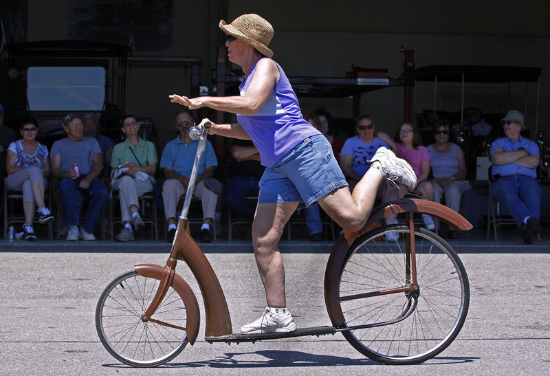 Claire Putnam of Portland shows off her style during the Ingo Bike riding competition. The Ingo Bike was produced in the early 1930s but never caught on with consumers.