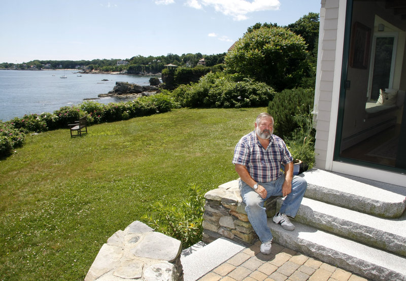 Bob Blackwood's property, located on a cliffside high off the ocean on Cloyster Street in South Portland, is in a newly designated floodplain zone.