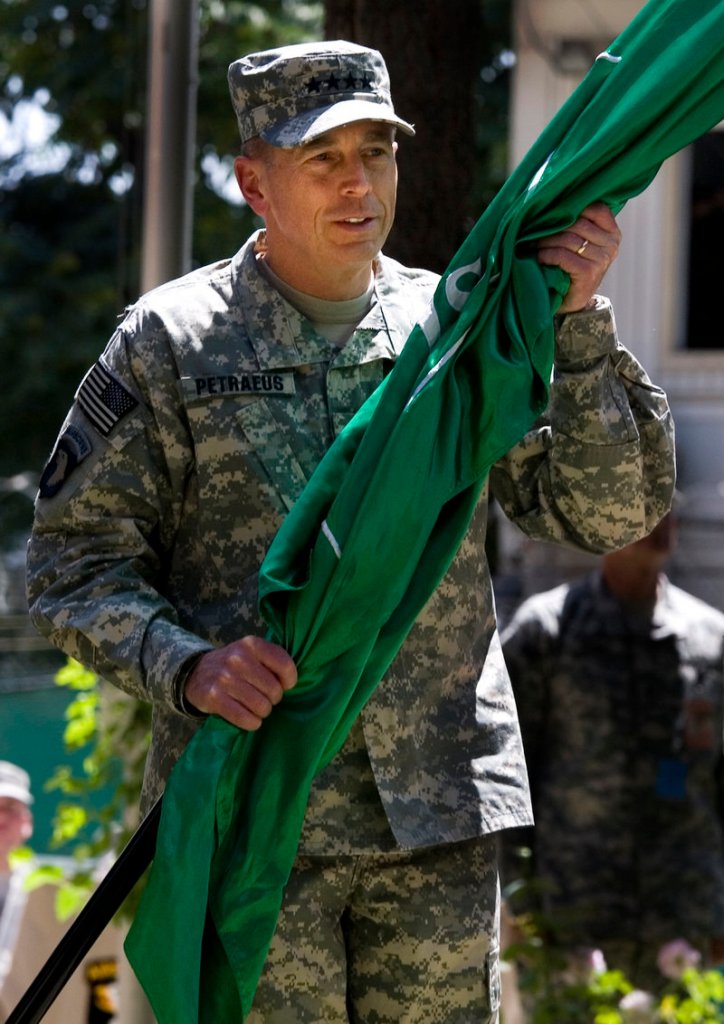Gen. David Petraeus accepted command of U.S. and NATO forces in Afghanistan on Sunday.