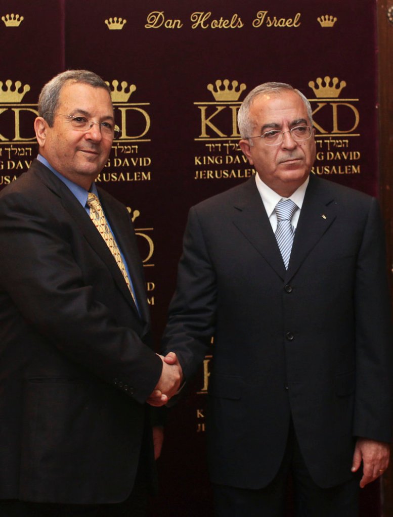 Israeli Defense Minister Ehud Barak, left, meets with Palestinian Prime Minister Salam Fayyad in Jerusalem on Monday, as Israel redefined the rules of its controversial Gaza Strip embargo.