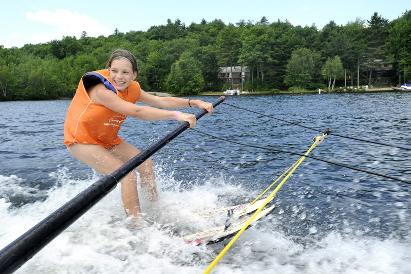 Erin McNeil, 13, of Biddeford, learns to water ski Tuesday. The In His Wakes program came to Windham thanks to Nancy Goslin, a member who raised $100 for each youth who participated.