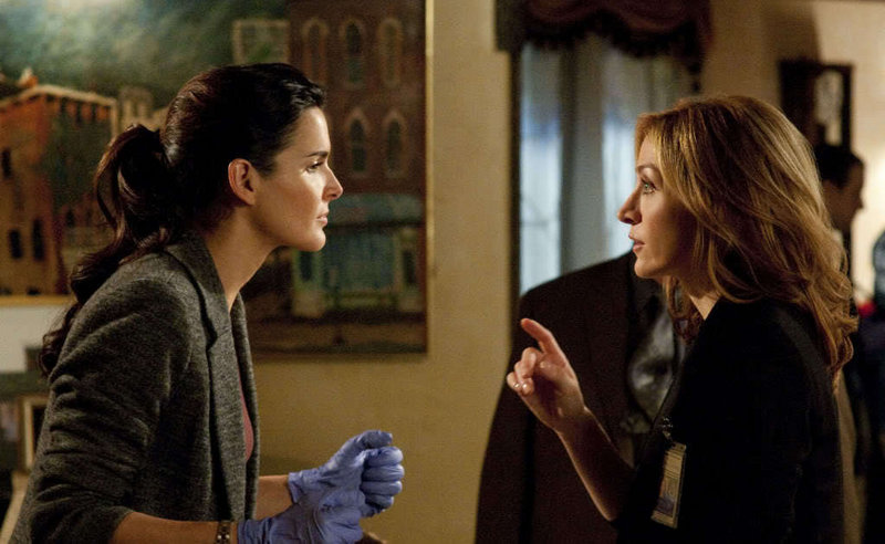 Angie Harmon, left, and Sasha Alexander star in the new TNT series "Rizzoli & Isles," which premieres Monday.