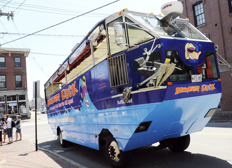 The Downeast Duck Adventures amphibious craft waits for passengers Thursday at Commercial and Pearl streets in Portland.