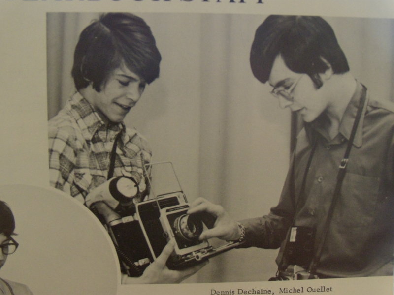 In a yearbook photo from Dennis Dechaine's junior year at Madawaska High School, the teenage Dechaine, left, holds a camera that he used when he was on the yearbook staff. "The camera was bigger than him," said his childhood friend Carol Waltman.