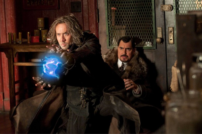 Nicolas Cage, left, as Balthazar Blake and Alfred Molina as Horvath in "The Sorcerer's Apprentice," loosely based on the Disney animated classic, "Fantasia."