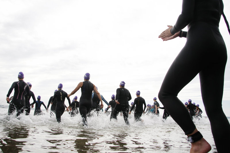 There was a long swim  and bike ride  and road race ahead Saturday as competitors entered the water at East End Beach in Portland to begin the fourth annual Urban Epic Triathlon.