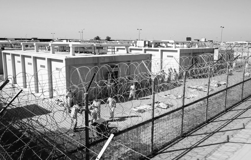 Detainees are seen outside their cell block in 2008 at the U.S. detention facility at Camp Cropper in Baghdad, Iraq. As of today, Camp Cropper will be run by the Iraqi government.