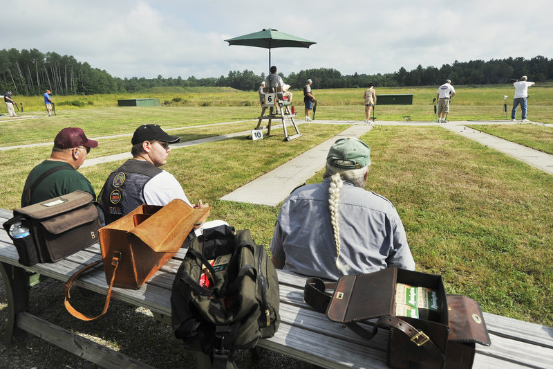 As the competitors fire away in the state’s longest-running shoot – 120 years and counting – spectators and other contestants keep watch on the proceedings.