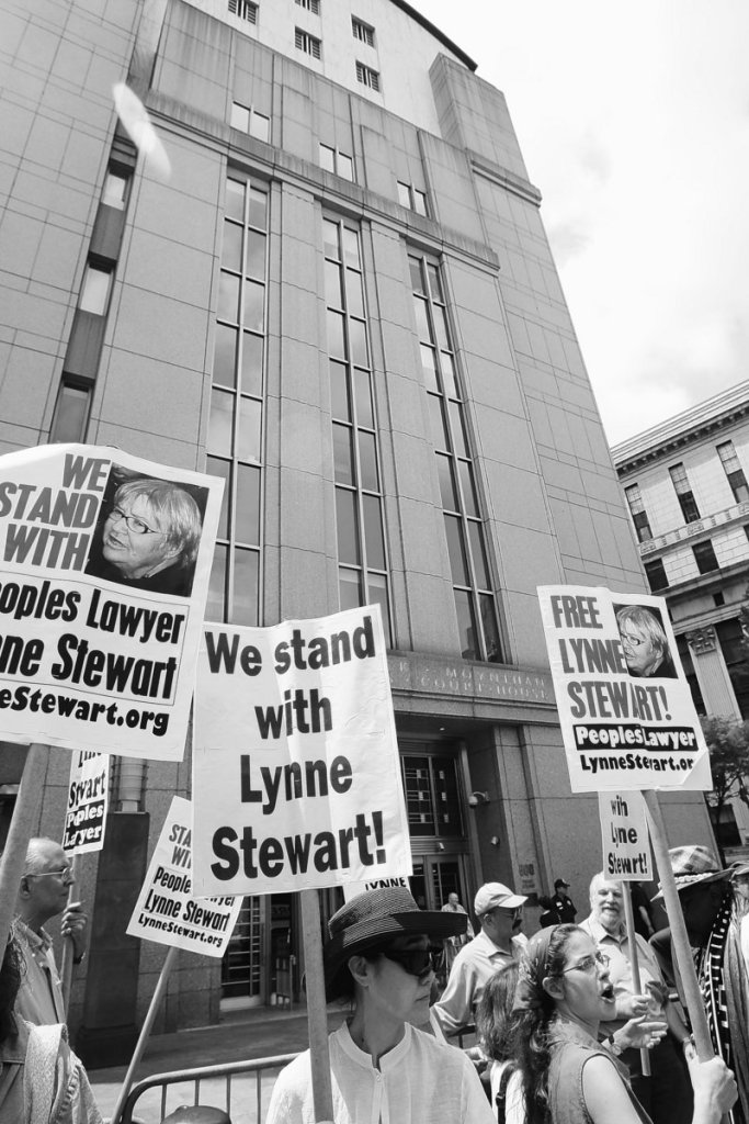 Supporters of lawyer Lynne Stewart gather near federal court in New York, where a judge resentenced her to 10 years in prison Thursday.
