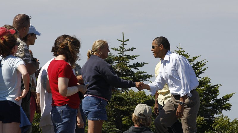 Obama greets visitors on Cadillac Mountain in Acadia National Park.